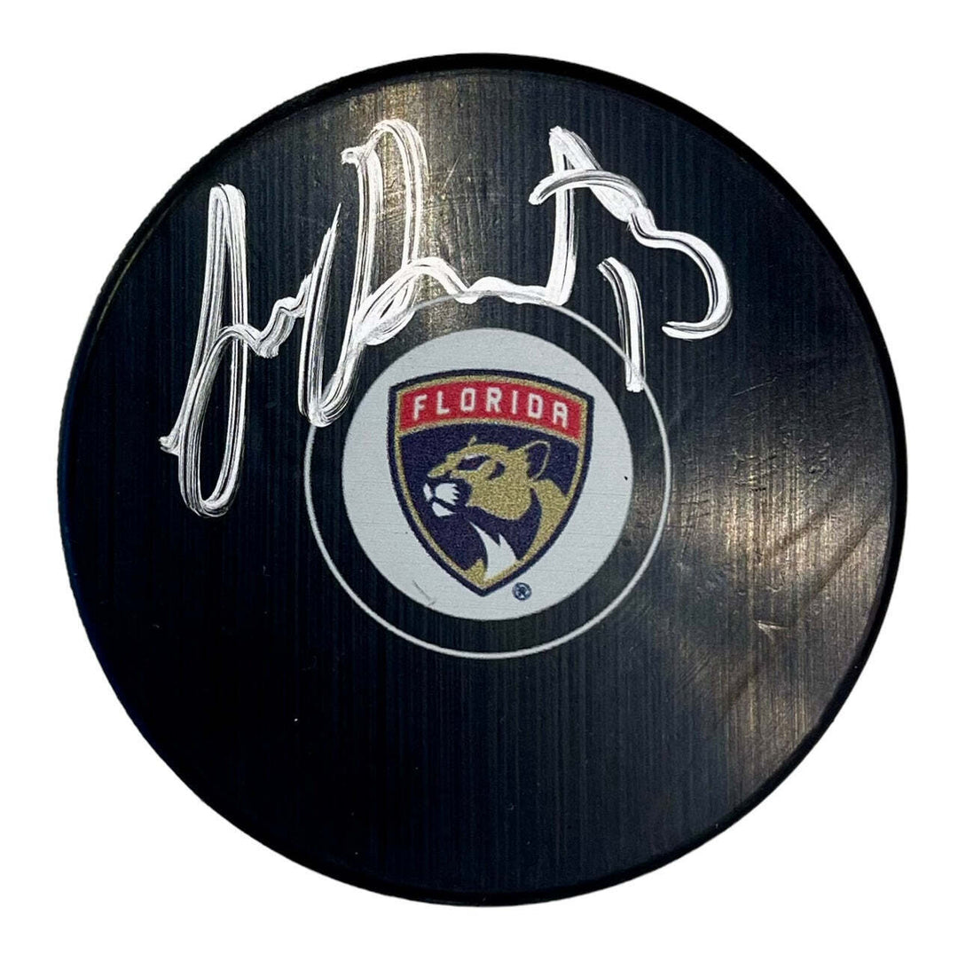 Sam Reinhart Autographed Florida Panthers Logo Puck (JSA) Image 1