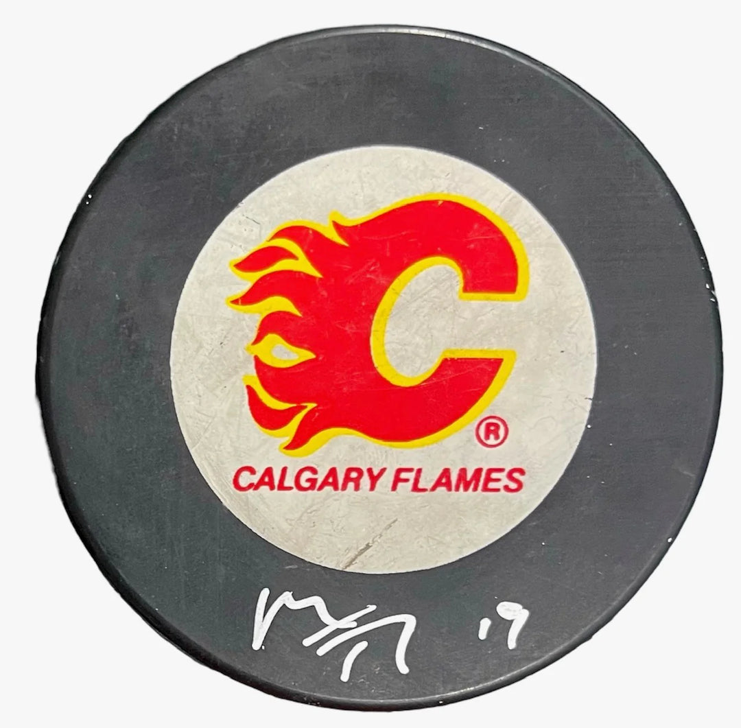 Matthew Tkachuk Autographed Calgary Flames Logo Puck Image 1