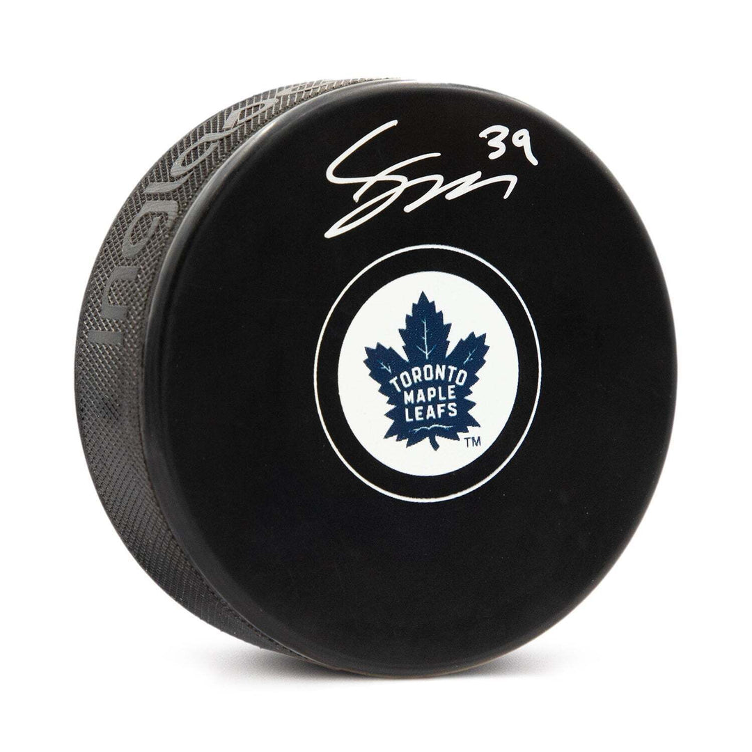 Fraser Minten Autographed Toronto Maple Leafs Hockey Puck Image 1