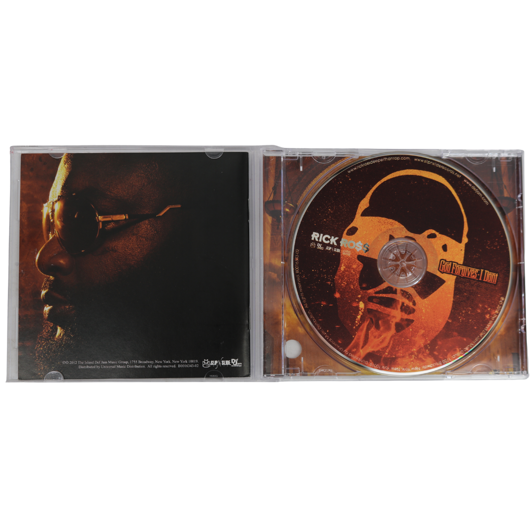 Rick Ross Autographed God Forgives, I Don't CD