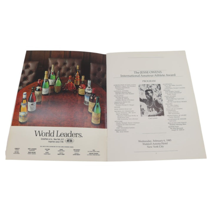Carl Lewis Autographed 1985 The Jesse Owens International Trophy Award Program JSA COA