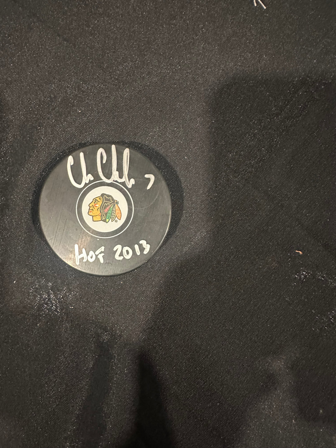 Chris Chelios signed  Blackhawks logo puck, with "HOF 2013" ins