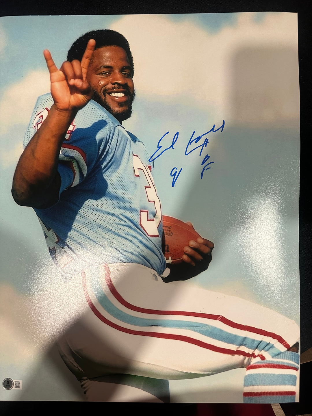 Earl Cambell signed 16x20 photo with "hof 91" ins