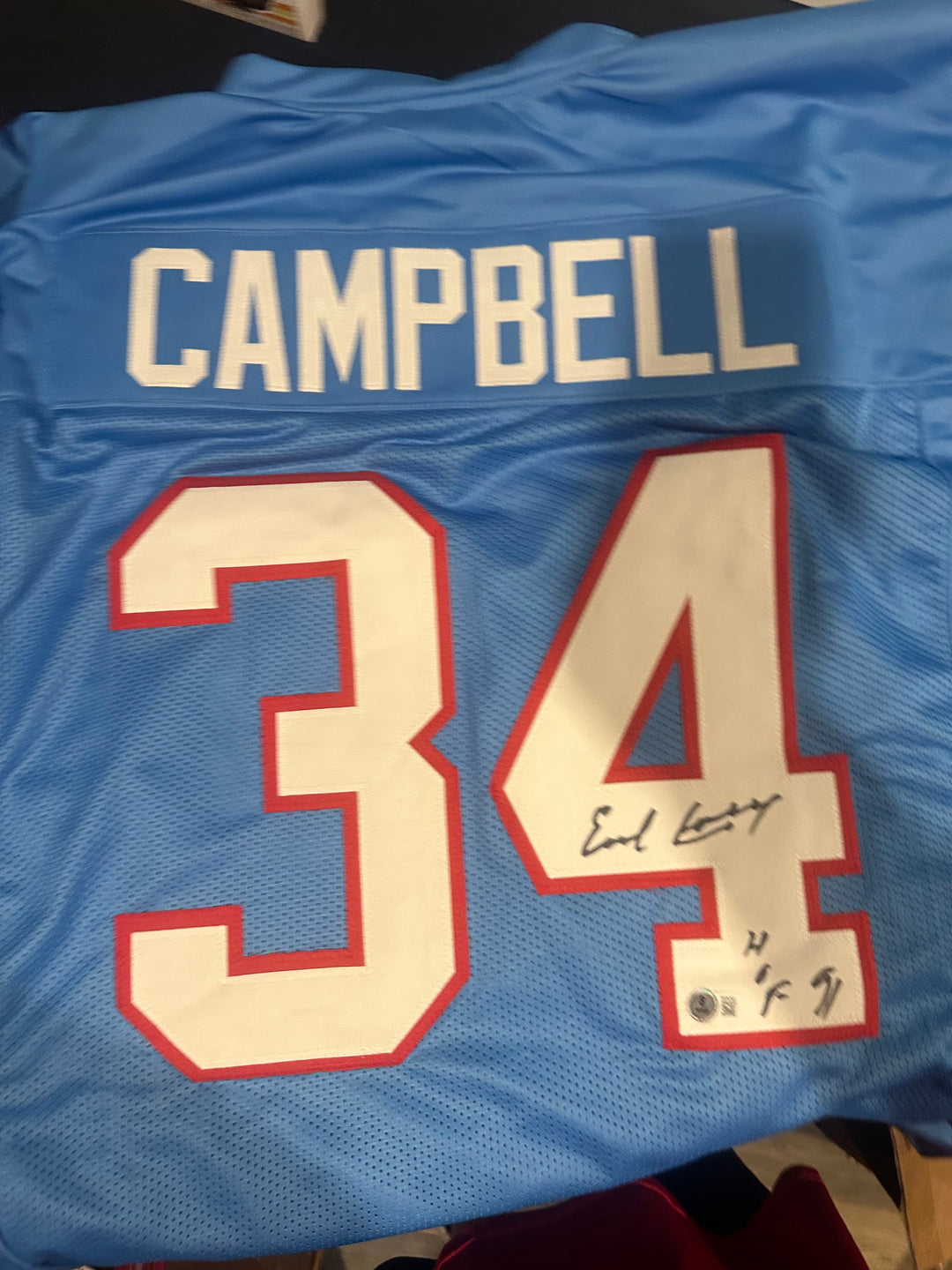 Earl Campbell signed custom Oilers jersey,with "HOF 91" ins