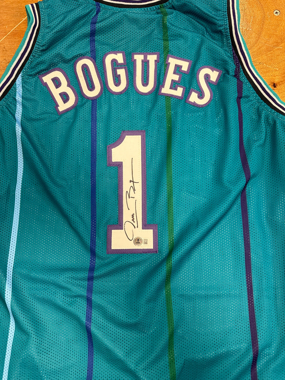 Muggsy Bogues signed custom jersey