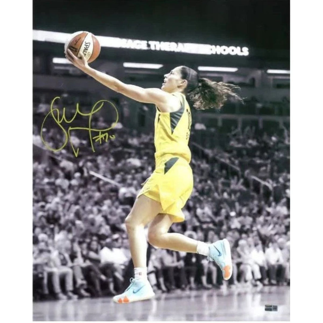 Sue Bird Seattle Storm Autographed 16x20 Spotlight Layup Photograph Signed in Yellow (CX Auth)