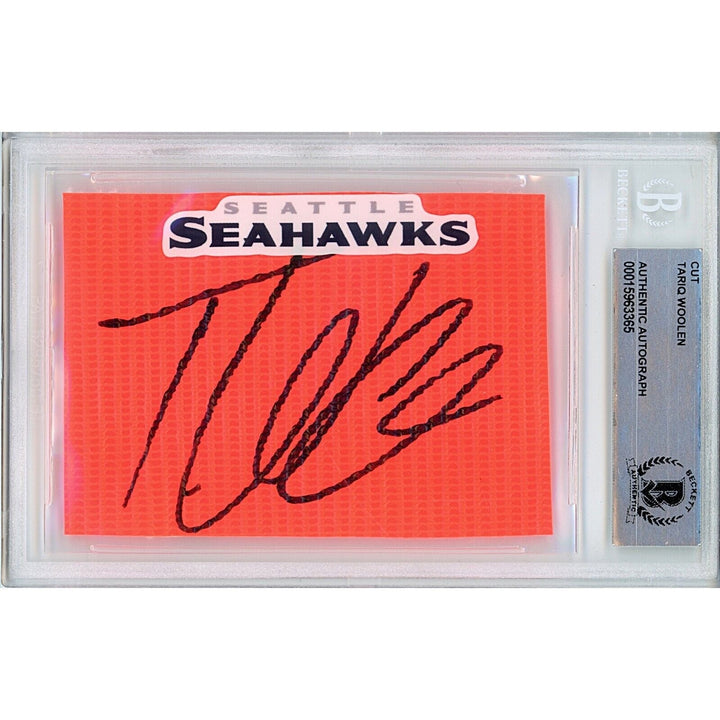 Footballs- Autographed- Tariq Woolen Seattle Seahawks Signed Football End Zone Pylon Signature Cut Beckett Authentic Auto Slab Front