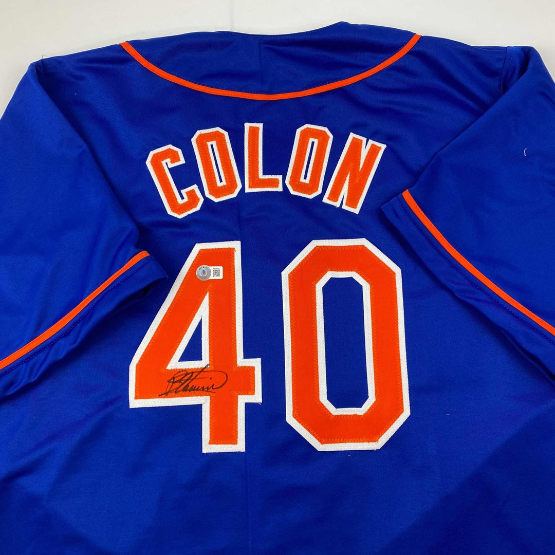 Autographed/Signed Bartolo Colon New York Blue Jersey Beckett BAS COA