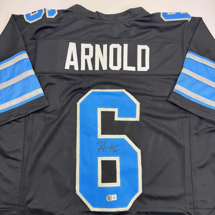 Autographed/Signed Terrion Arnold Detroit Black Football Jersey Beckett BAS COA