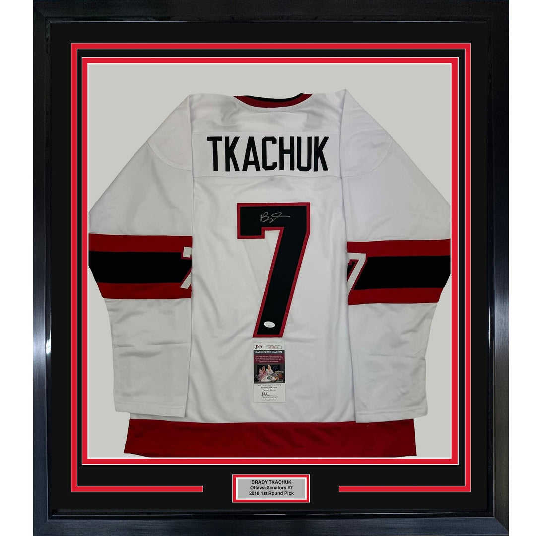 Framed Autographed/Signed Brady Tkachuk 35x39 Ottawa White Jersey JSA COA