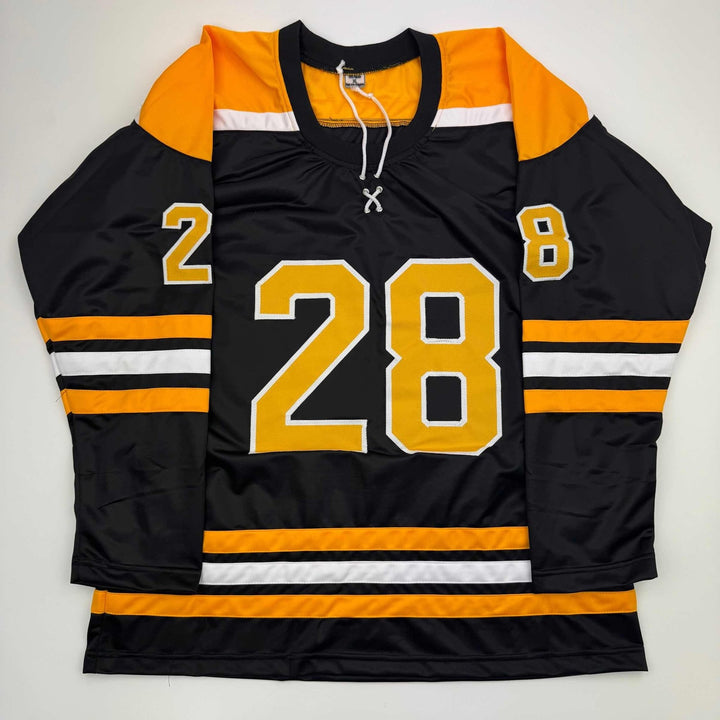Autographed/Signed Elias Lindholm Boston Black Hockey Jersey JSA COA