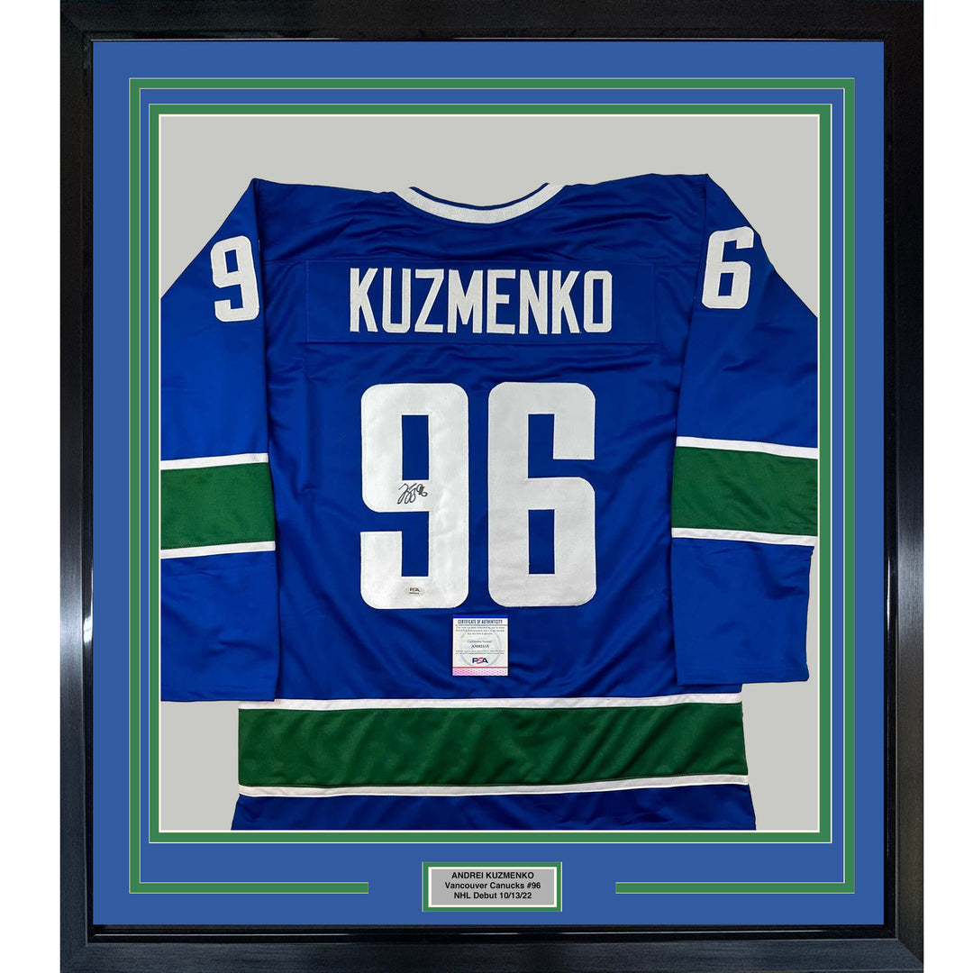 Framed Autographed/Signed Andrei Kuzmenko 33x42 Blue Jersey PSA/DNA COA