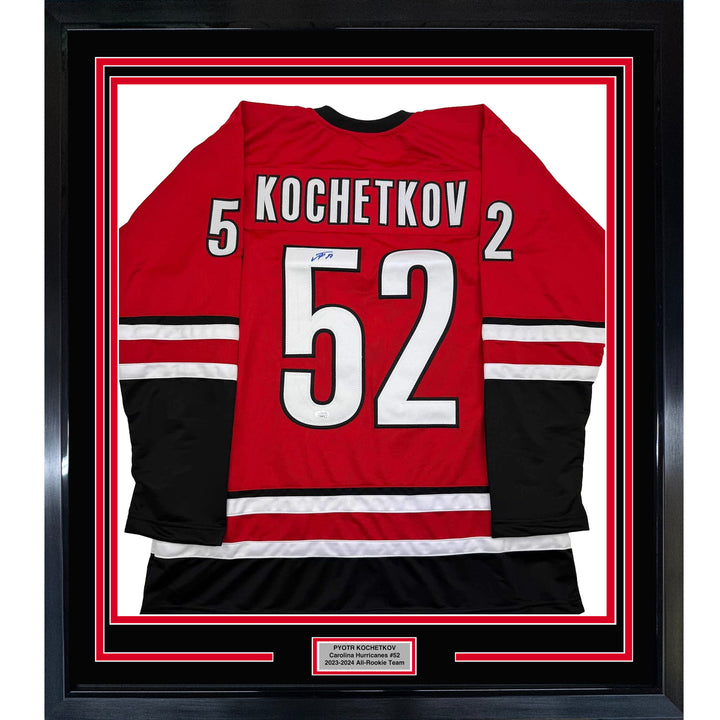 Framed Autographed/Signed Pyotr Kochetkov 35x39 Carolina Red Jersey JSA COA
