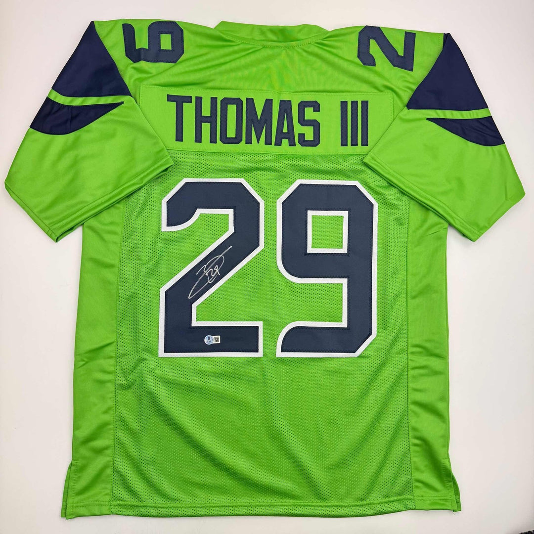 Autographed/Signed Earl Thomas III Seattle Green Jersey Beckett BAS COA
