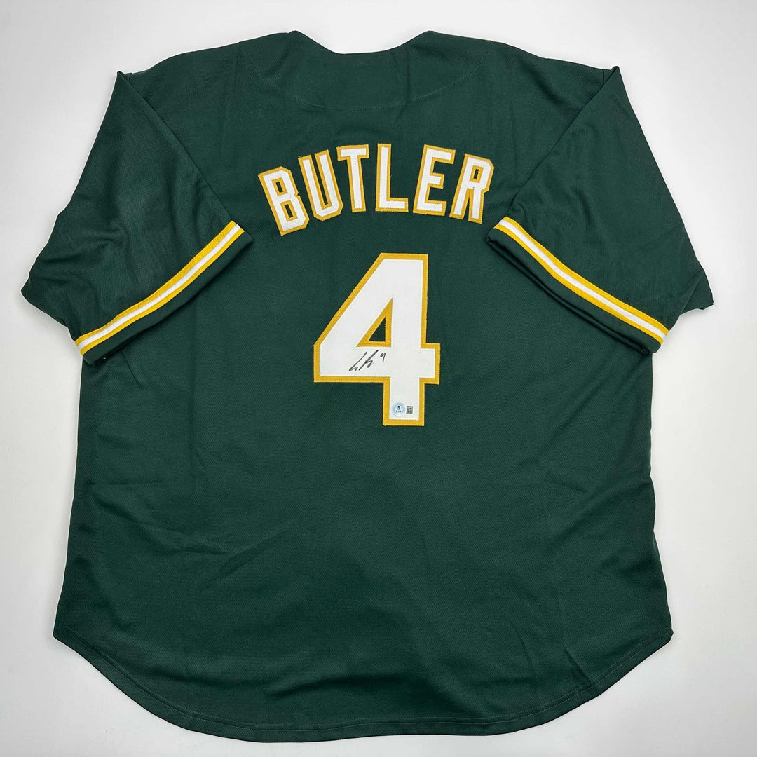 Autographed/Signed Lawrence Butler Oakland Green Jersey Beckett BAS COA