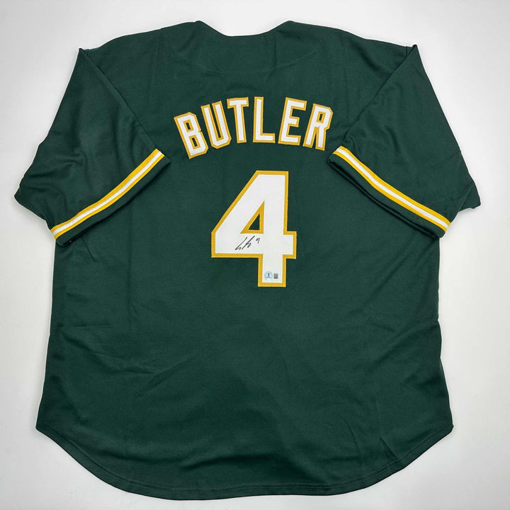 Autographed/Signed Lawrence Butler Oakland Green Jersey Beckett BAS COA