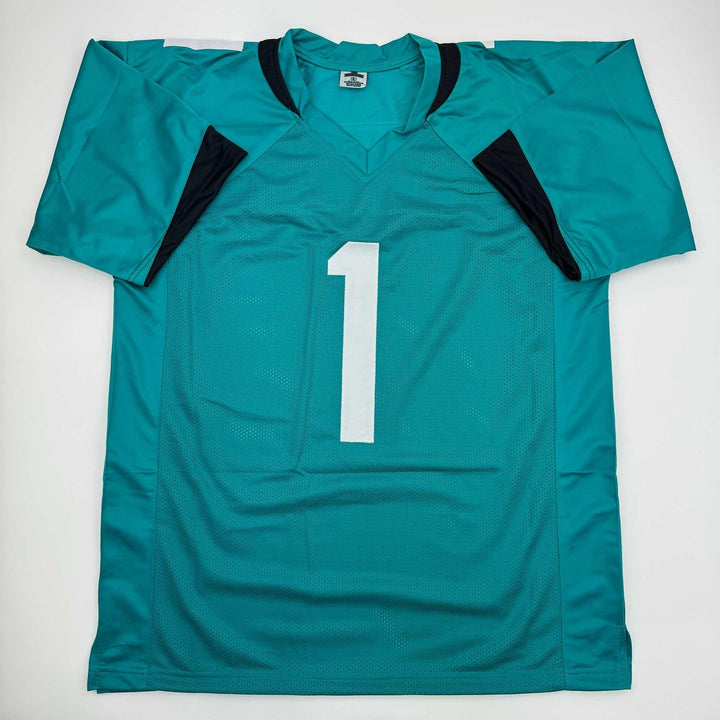 Autographed/Signed Travis Etienne Jr. Jacksonville Teal Jersey Beckett COA