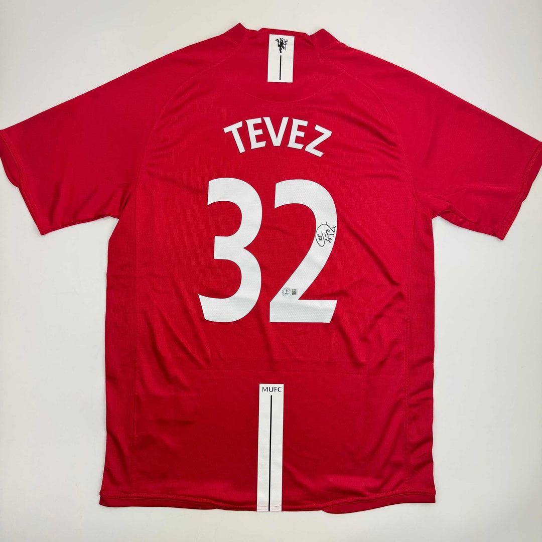 Autographed/Signed Carlos Tevez Manchester United Red Jersey Beckett COA