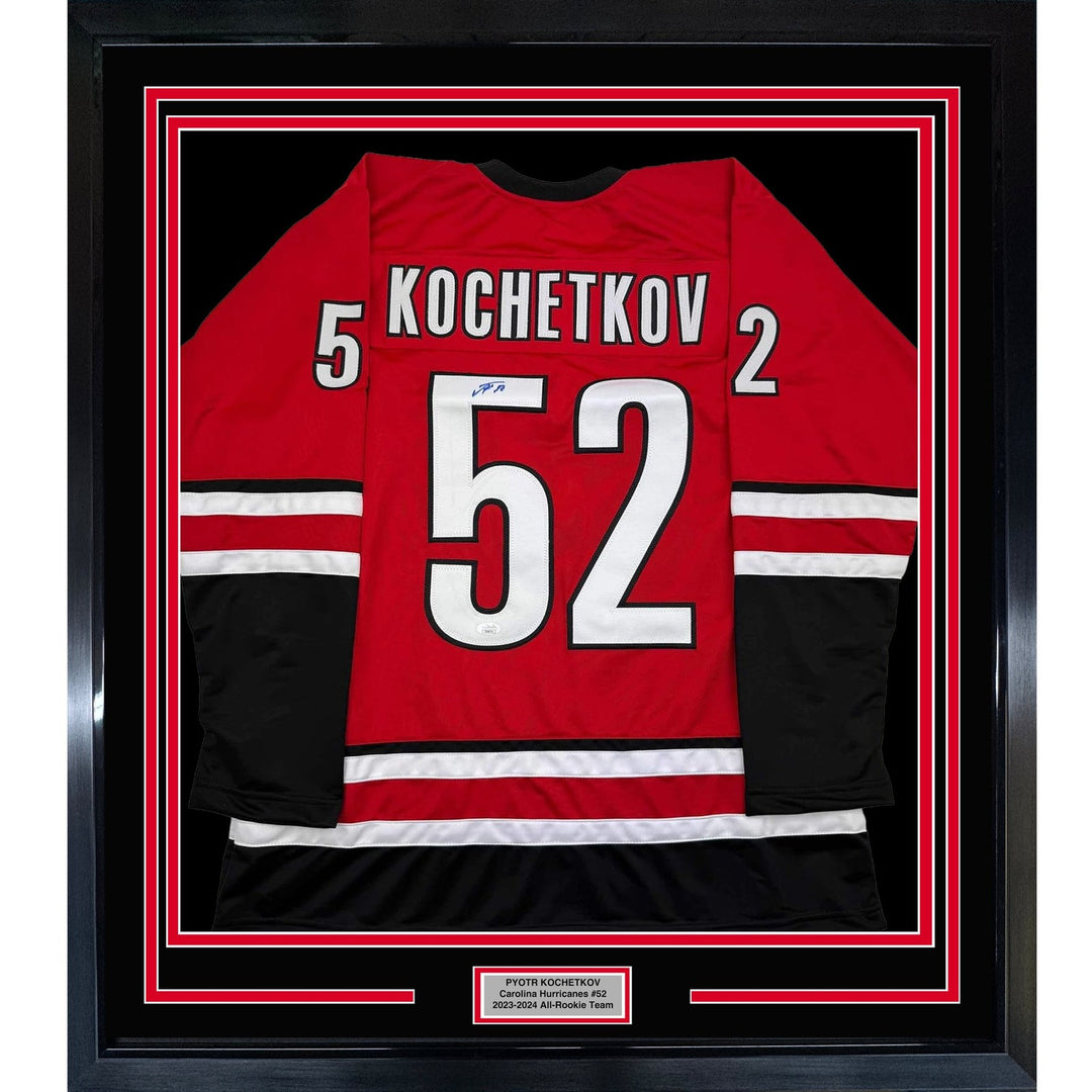 Framed Autographed/Signed Pyotr Kochetkov 35x39 Carolina Red Jersey JSA COA