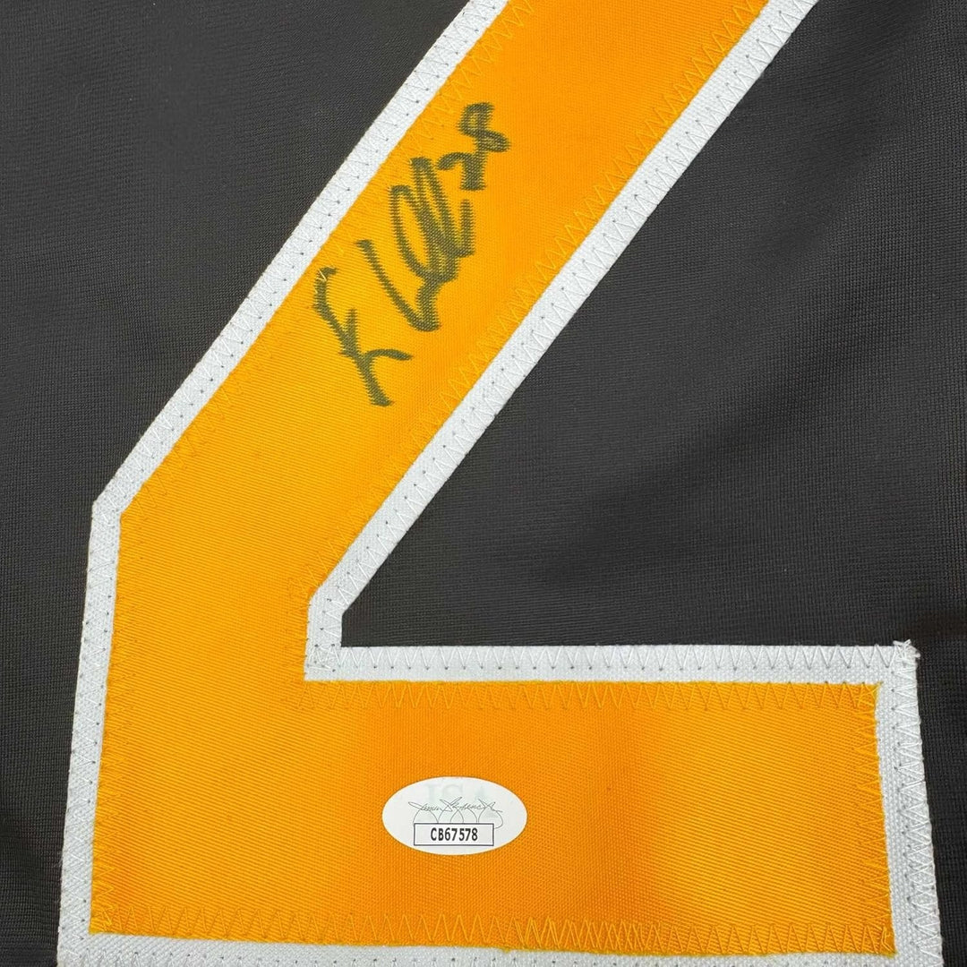 Framed Autographed/Signed Elias Lindholm 35x39 Black Hockey Jersey JSA COA
