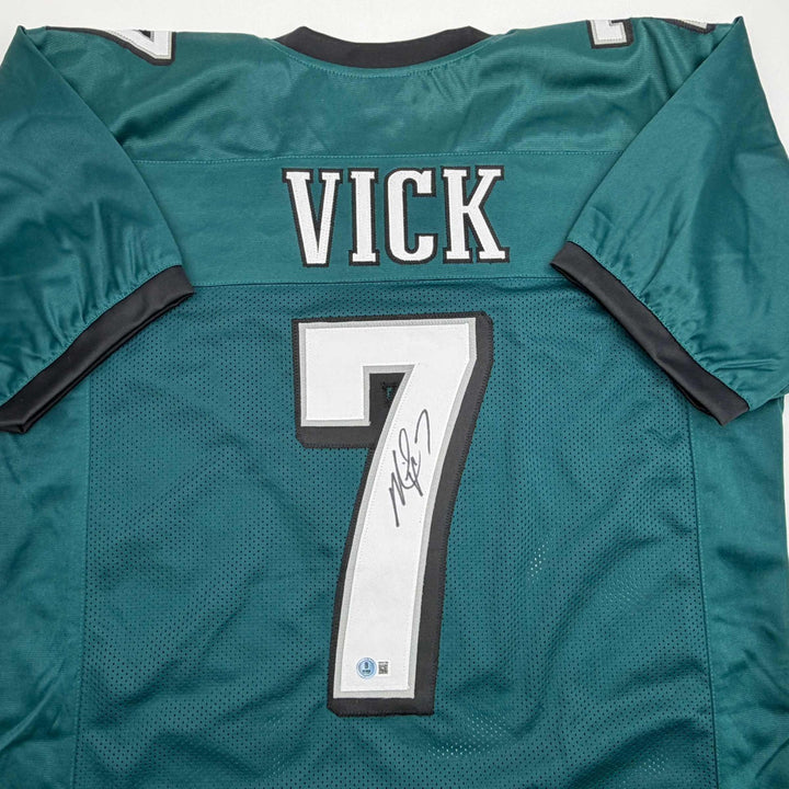 Autographed/Signed MICHAEL MIKE VICK Philadelphia Green Football Jersey PSA COA