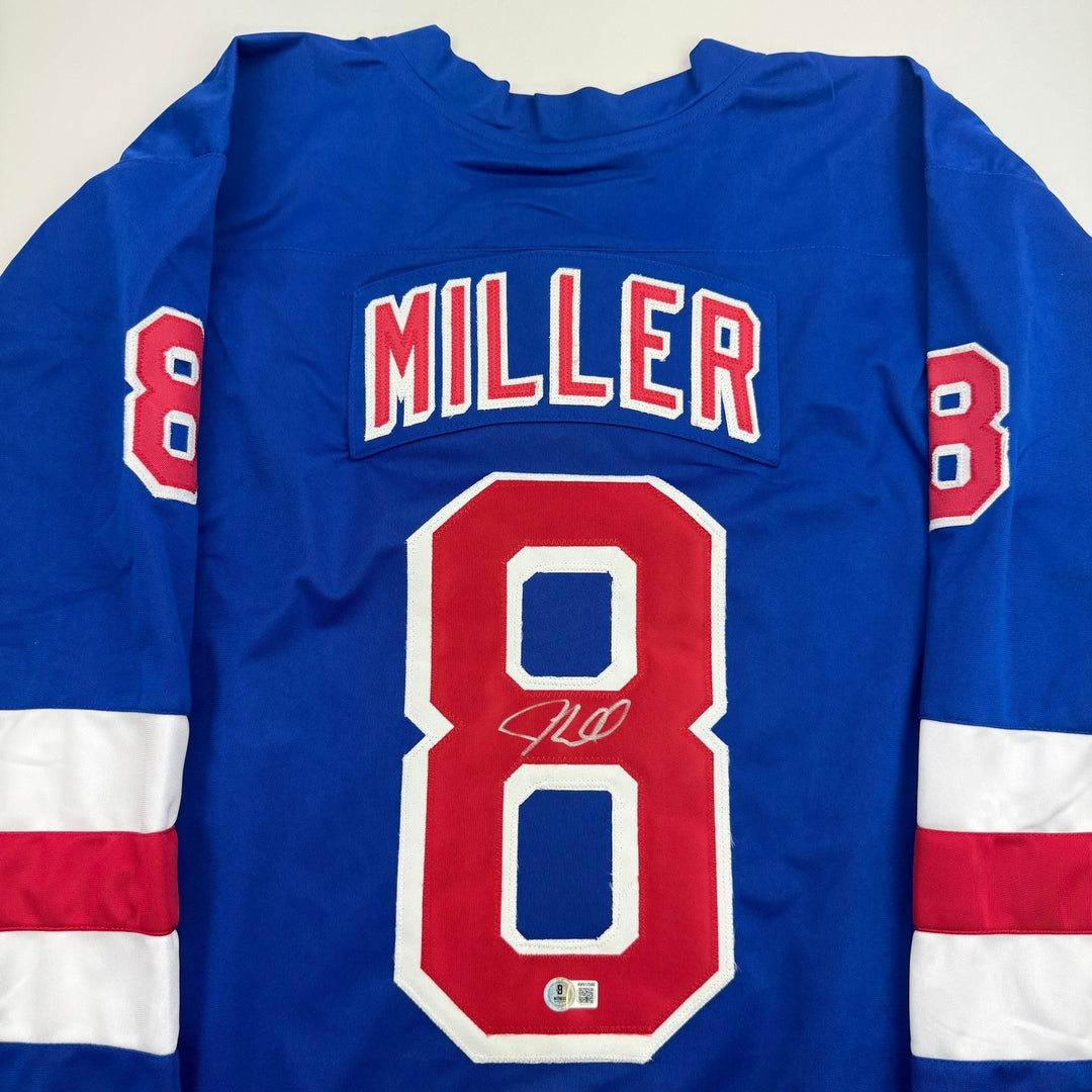 Autographed/Signed J.T. Miller New York Blue Hockey Jersey BAS COA