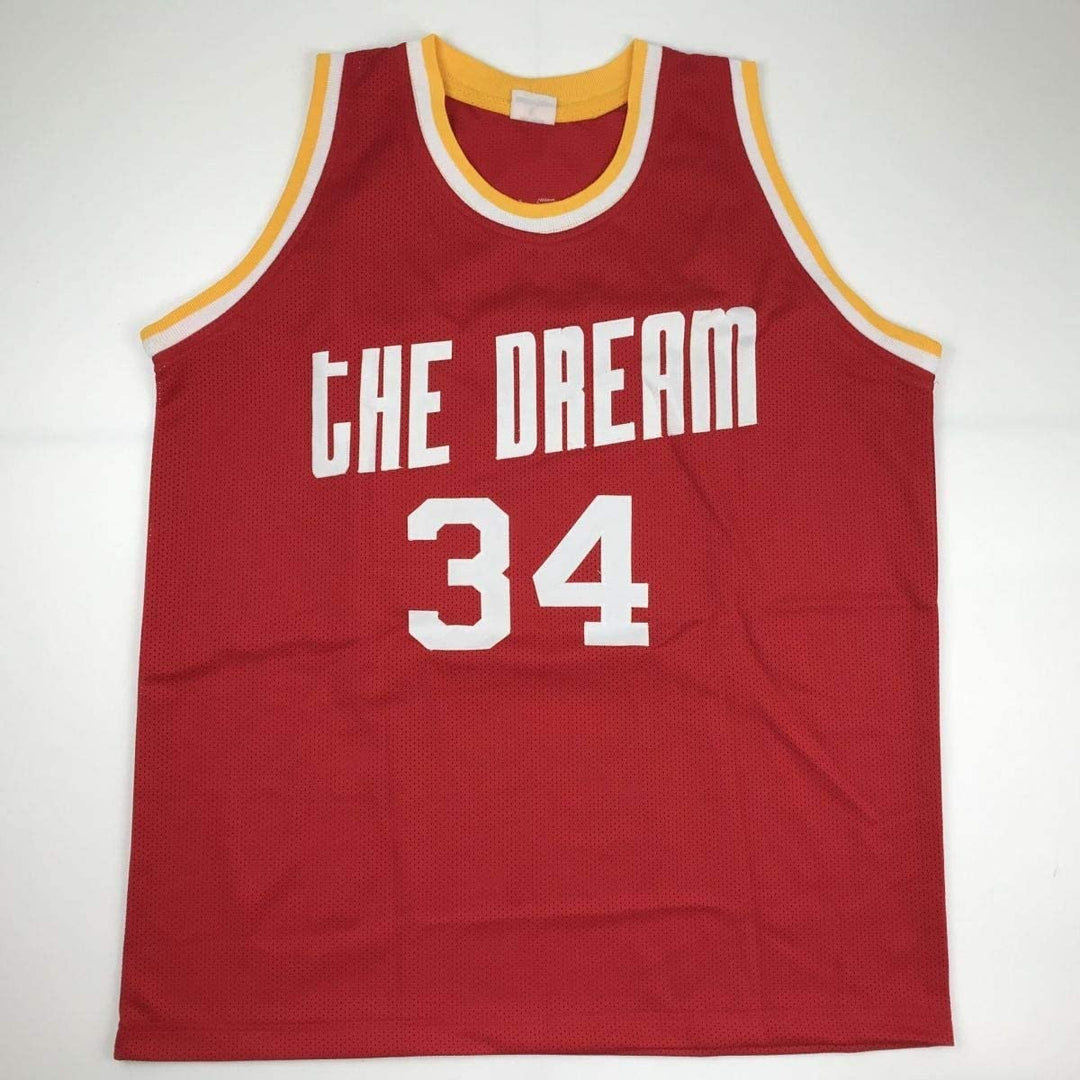 Autographed/Signed Hakeem Olajuwon Houston Red Jersey Beckett COA