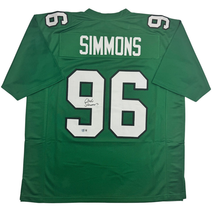 Autographed/Signed Clyde Simmons Philadelphia Green Football Jersey Beckett COA