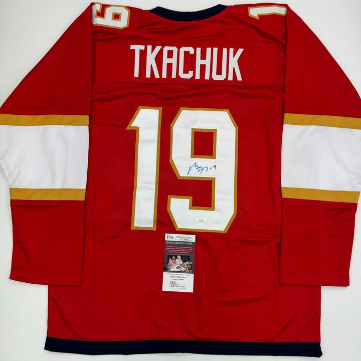 Autographed/Signed Matthew Tkachuk Florida Red Hockey Jersey JSA COA