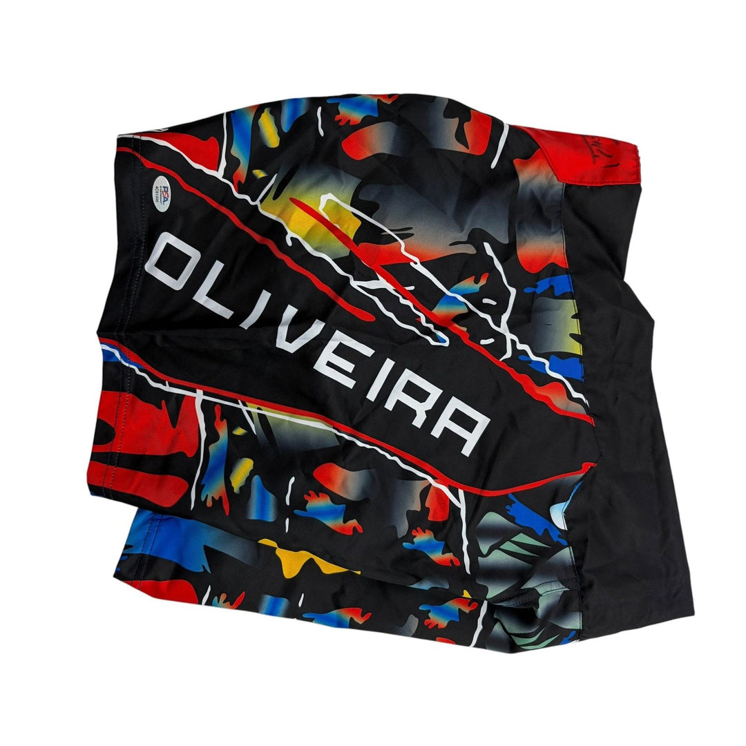 Autographed/Signed Charles Oliveira UFC MMA Trunks Shorts PSA/DNA COA