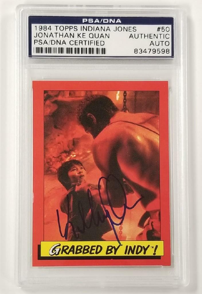 Jonathan Ke Quan signed 1984 Topps Indiana Jones #50 Grabbed by Indy Card ~ PSA