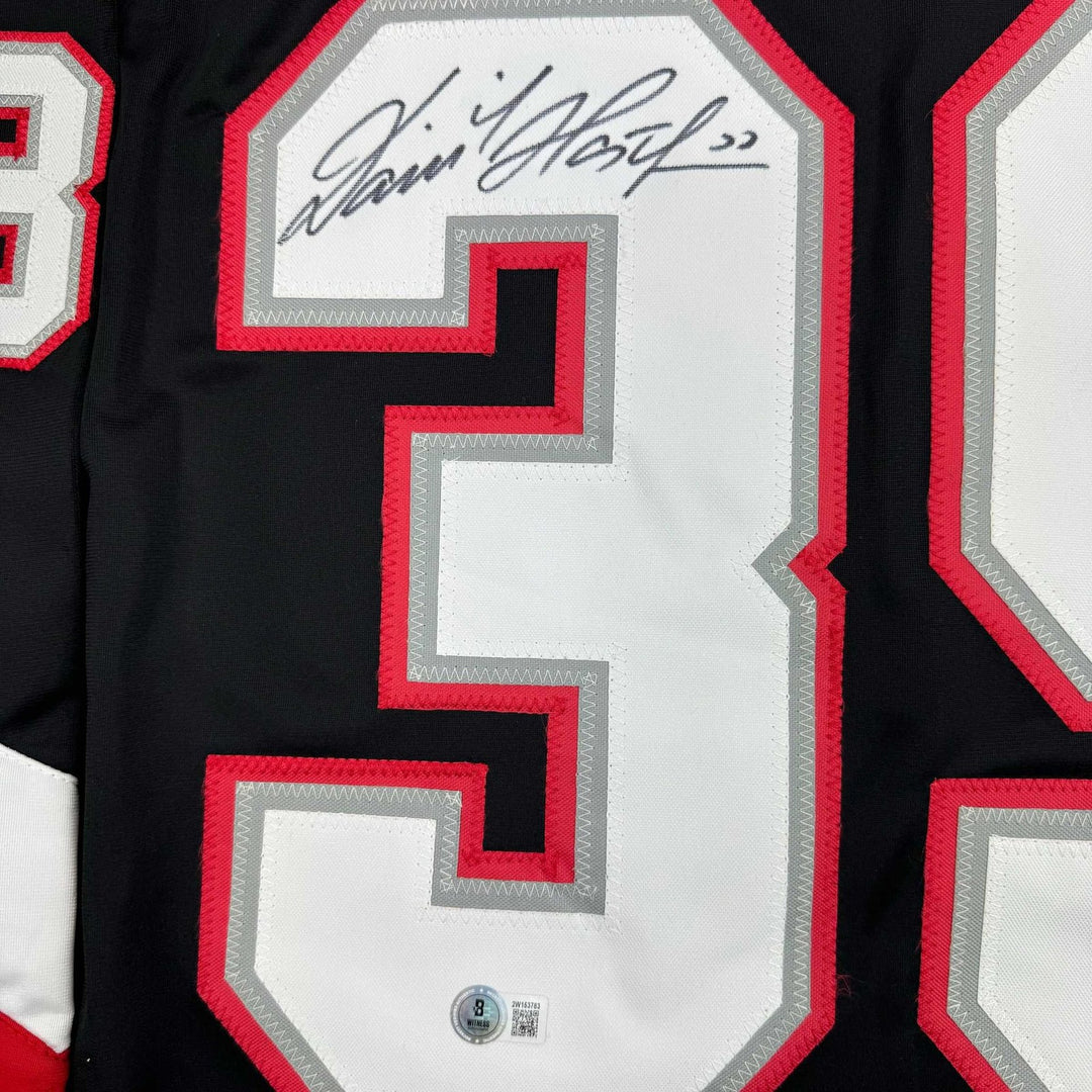 Autographed/Signed Dominik Hasek Buffalo Black Jersey Beckett BAS COA