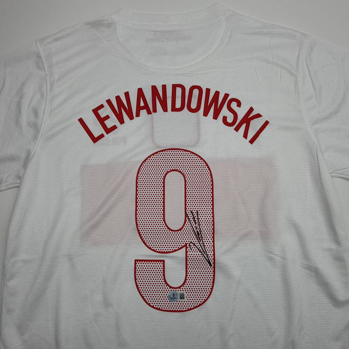 Autographed/Signed Robert Lewandowski Poland White Soccer Jersey Beckett BAS COA