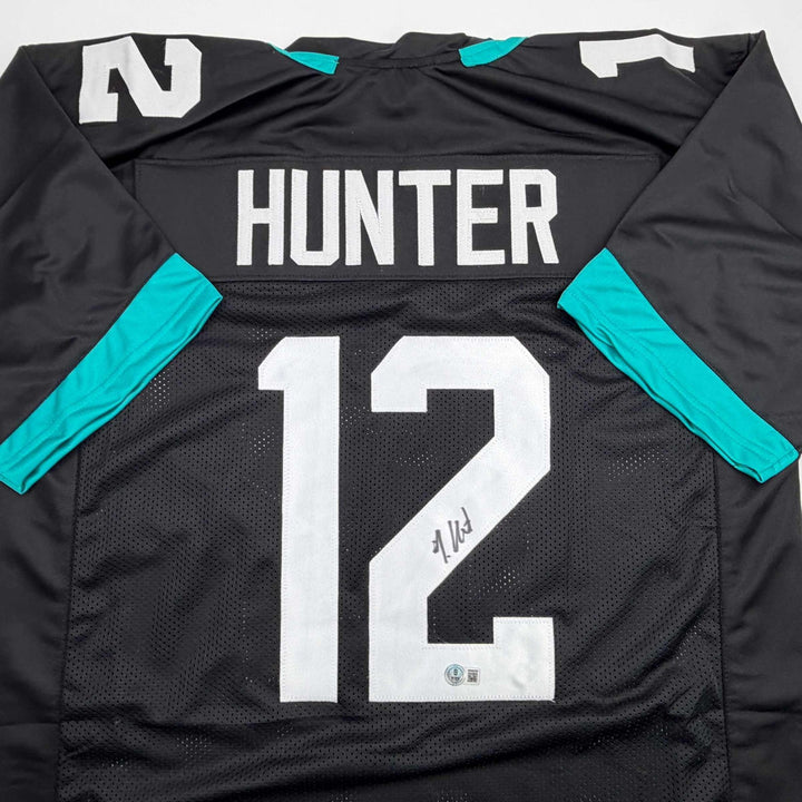 Autographed/Signed Travis Hunter Jacksonville Black Jersey Beckett BAS COA