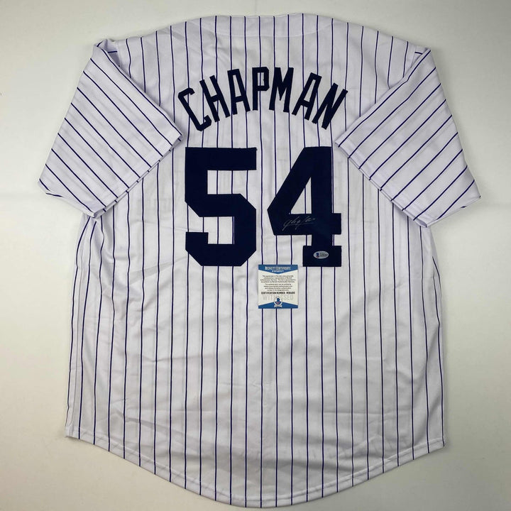 Autographed/Signed Aroldis Chapman New York Pinstripe Jersey Beckett COA