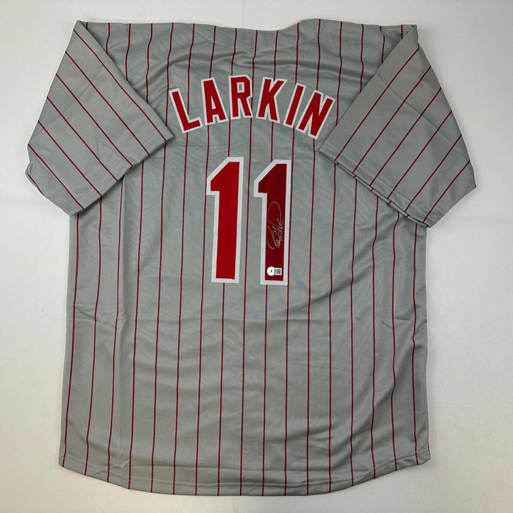 Autographed/Signed Barry Larkin Cincinnati Grey Pinstripe Jersey Becket