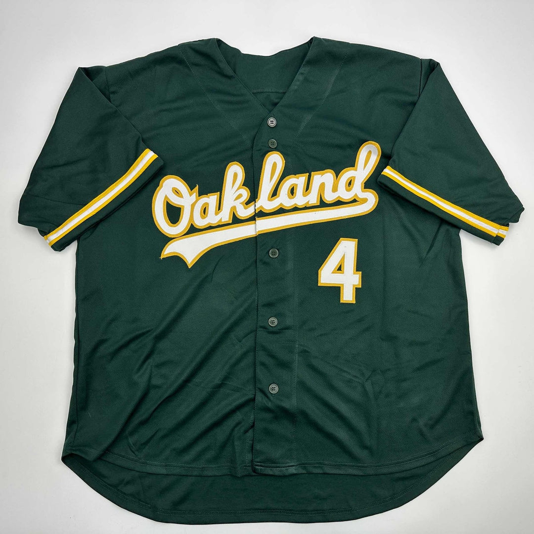 Autographed/Signed Lawrence Butler Oakland Green Jersey Beckett BAS COA
