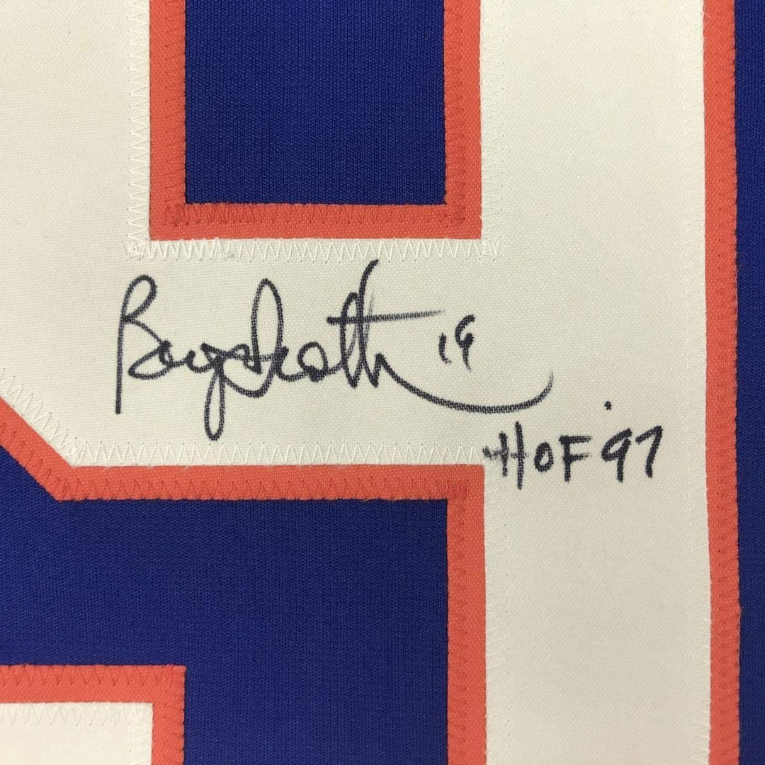 Autographed/Signed Bryan Trottier HOF 97 New York Blue Jersey JSA COA
