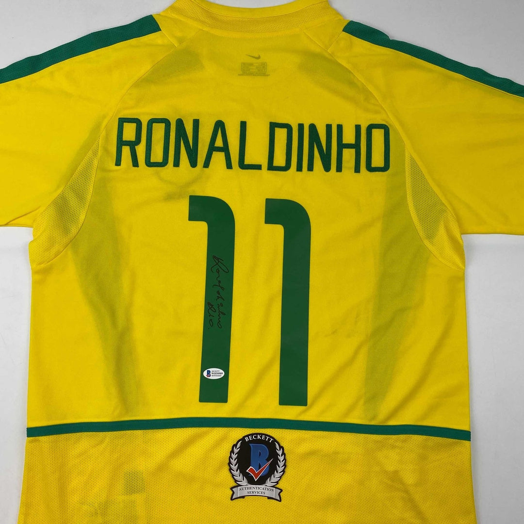 Autographed/Signed Ronaldinho Brazil Yellow Futbol Jersey Beckett BAS COA