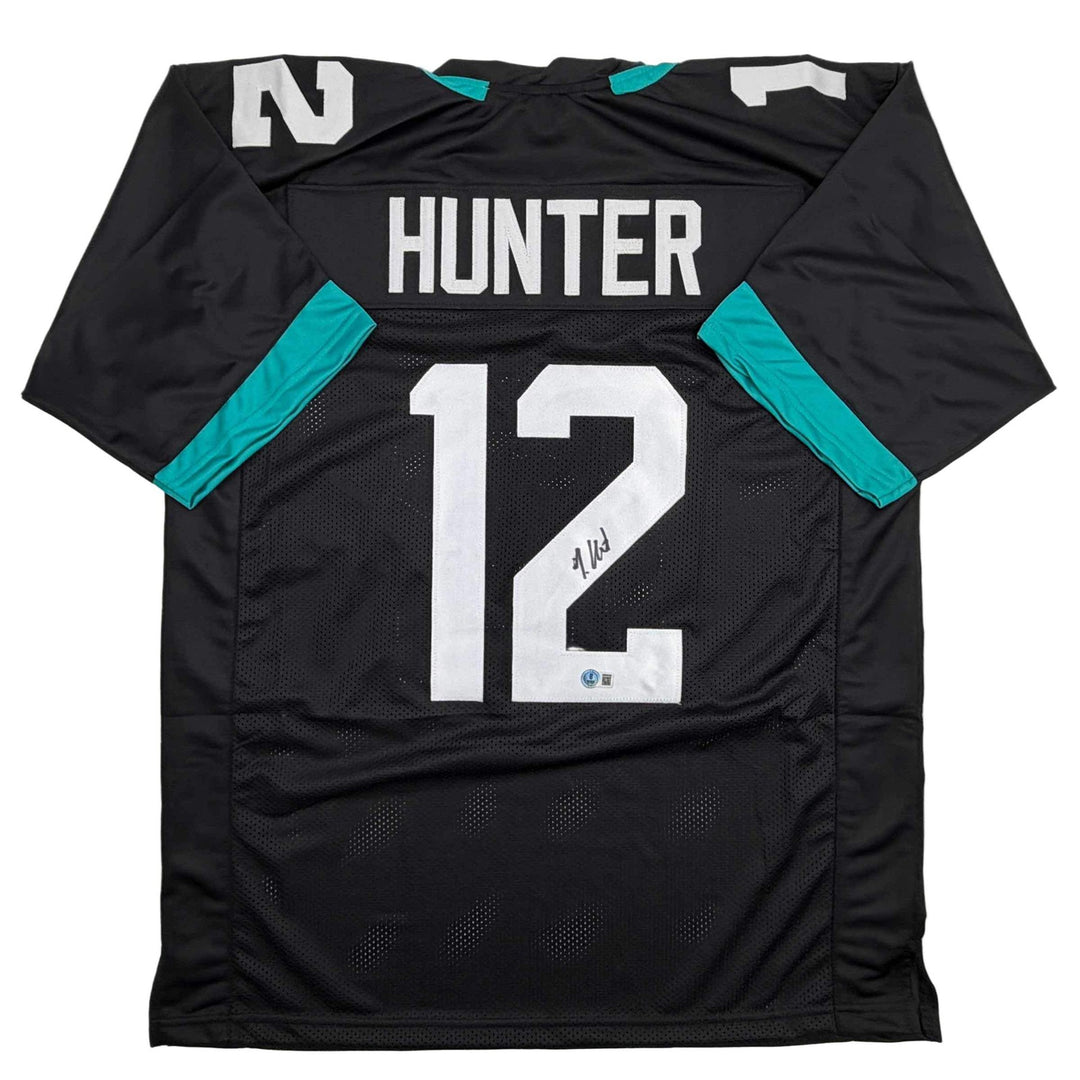 Autographed/Signed Travis Hunter Jacksonville Black Jersey Beckett BAS COA