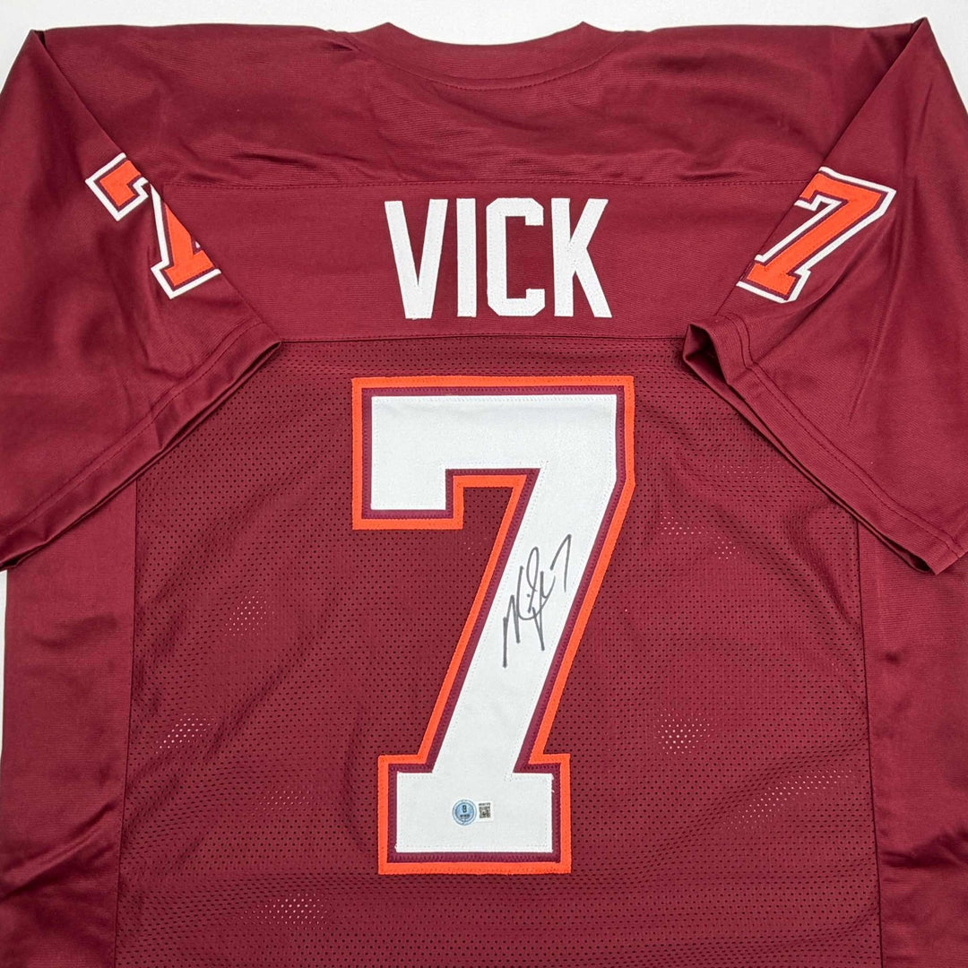 Autographed/Signed MICHAEL MIKE VICK Virginia Tech Maroon Jersey PSA COA