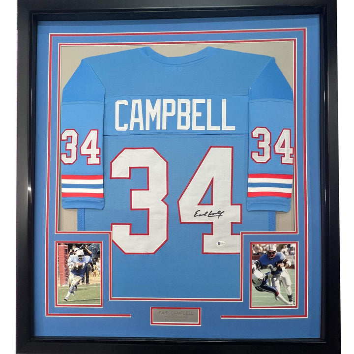 FRAMED Autographed/Signed EARL CAMPBELL 33x42 Houston Blue Jersey JSA COA Auto