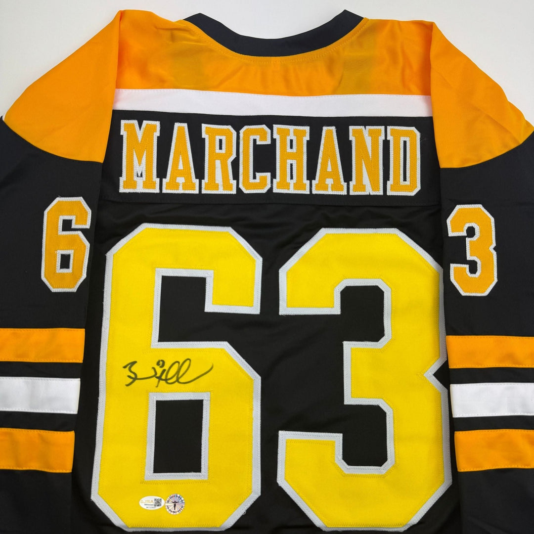 Autographed/Signed Brad Marchand Boston Black Hockey Jersey JSA COA