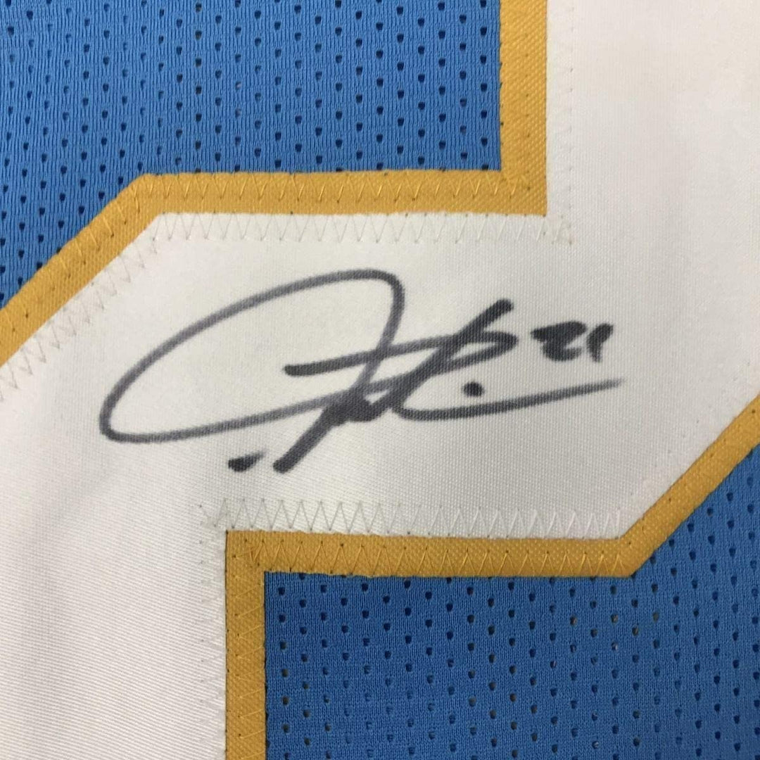 FRAMED Signed LADAINIAN TOMLINSON 35x39 Powder Blue Jersey JSA COA
