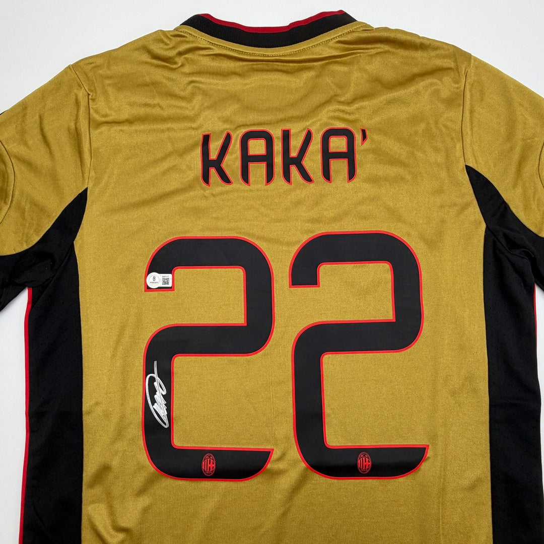 Autographed/Signed Ricardo Kaka AC Milan Gold Soccer Jersey Beckett BAS COA