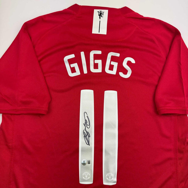 Autographed/Signed Ryan Giggs Manchester United Red Jersey Beckett BAS COA