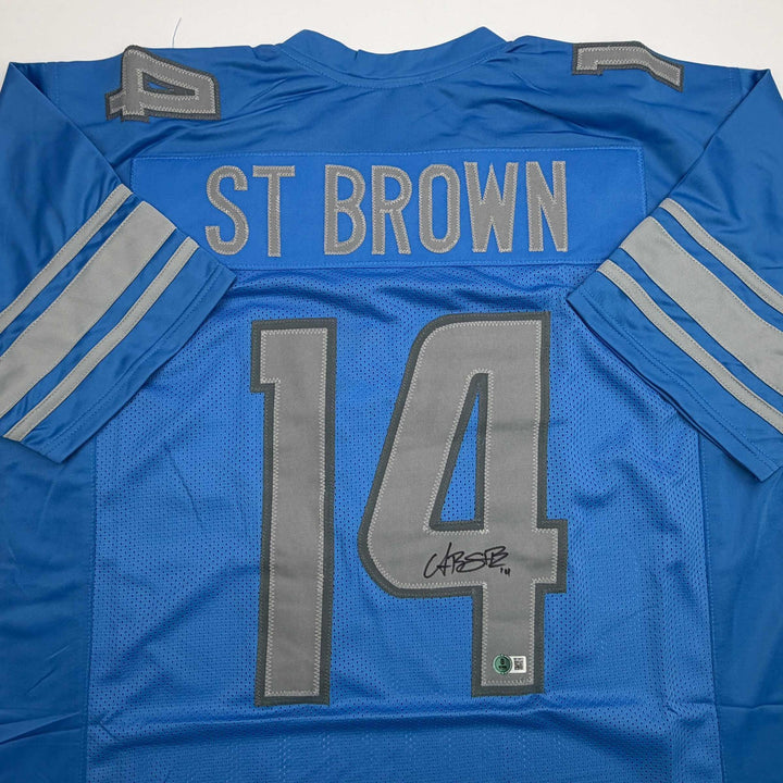 Autographed/Signed Amon-Ra St. Brown Detroit Blue Jersey Beckett BAS COA