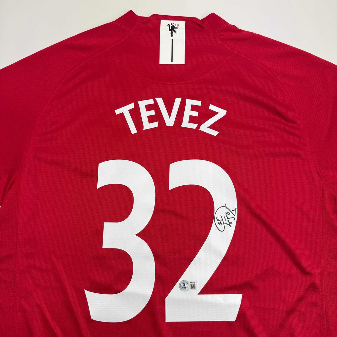 Autographed/Signed Carlos Tevez Manchester United Red Jersey Beckett BAS COA