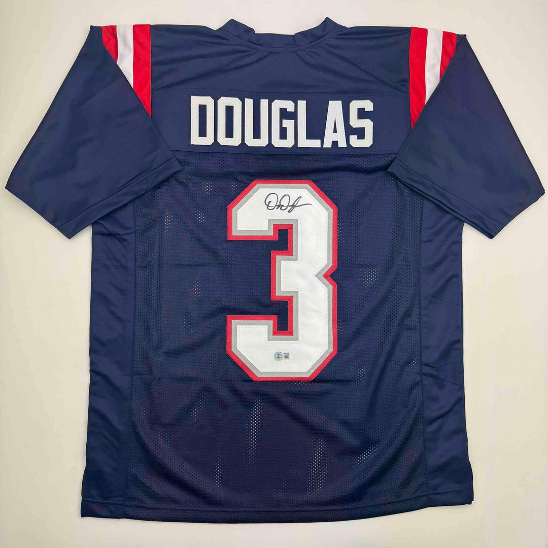 Autographed/Signed DeMario Douglas New England Blue Jersey Beckett BAS COA