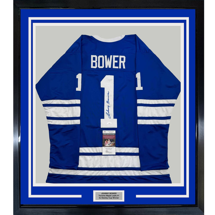 Framed Autographed/Signed Johnny Bower 35x39 Toronto Blue Jersey JSA COA